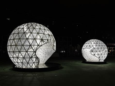 in celebration of the moon festival, spherical lanterns illuminate a ...