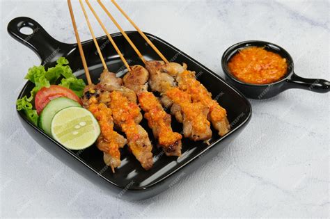 Premium Photo Sate Taichan Grilled Chicken Satay Served On Plate With