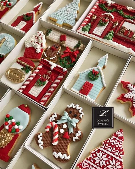 Many Decorated Cookies Are In Boxes On The Table