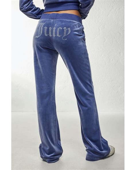 Juicy Couture Wild Blue Low Rise Velour Flare Track Pants Lyst Uk