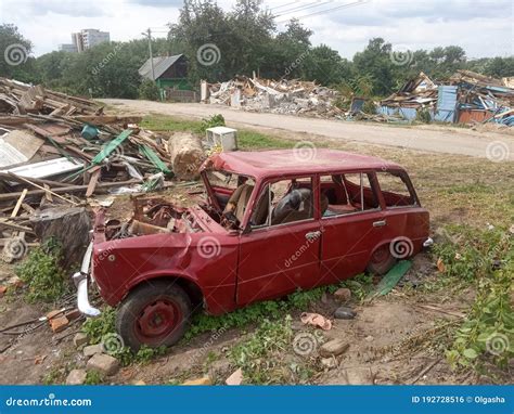 Old Broken Red Car Crashed And Abandoned Car After An Accident Stock