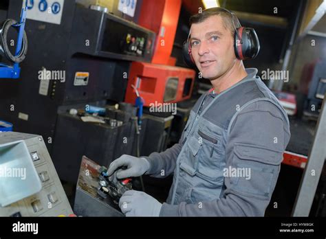 Portrait Of Man Operating Machinery Stock Photo Alamy