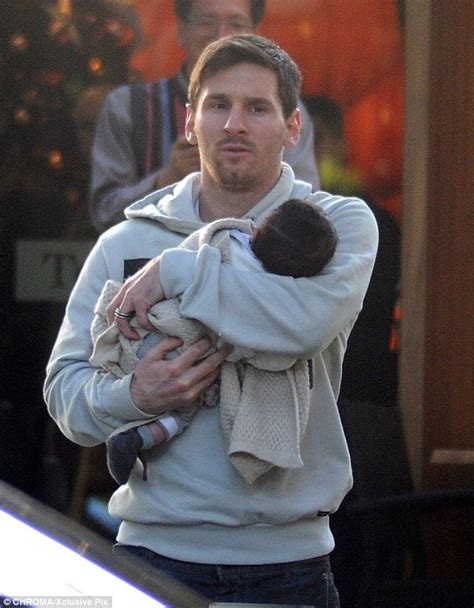 Barcelona Ace Lionel Messi Tenderly Kisses Newborn Son Thiago Daily Mail Online