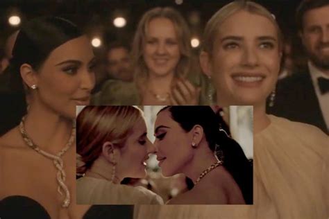 Watch Emma Roberts And Kim Kardashian Share A Kiss During The Oscars