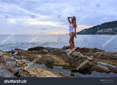 Sexy Blonde Woman White Swimsuit Standing Stock Photo Shutterstock