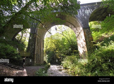 Abseiler Descends From Millers Dale Bridge On The Monsal Trail To The