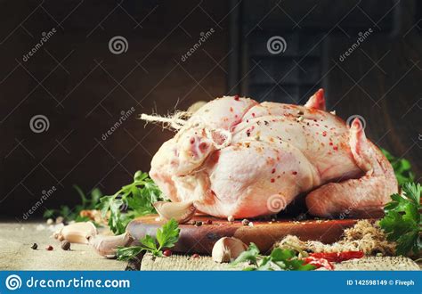 Raw Whole Chicken With Spices And Marinade For Cooking Old Wooden