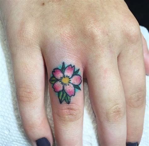 Simple Flower Finger Tattoo - Wiki Tattoo