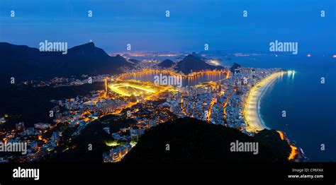 Rio De Janeiro South Zone At Night Ipanema And Leblon Beaches Statue Of