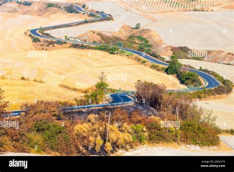 Country road and hills in Crete Senesi Tuscany Stock Photo - Alamy