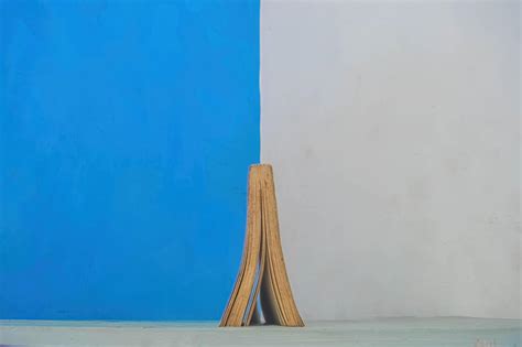 thick book open upside    backdrop   divided blue