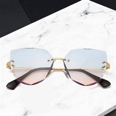 Rimless Cat Eye Sunglasses Women Frameless Metal Sun Glasses Fashion