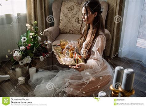 Beautiful Young Sweet Blonde Girl With A Wedding Bouquet In The Hands