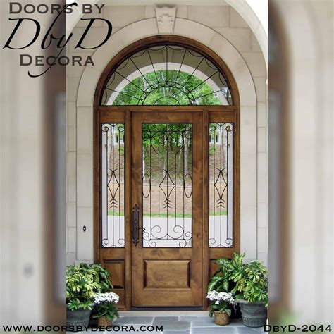 Custom French Country Entry With Iron Wood Doors - Doors by Decora