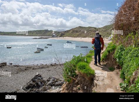 A Walker On The Coast Path At Porthdinllaen Near Morfa Nefyn Lleyn