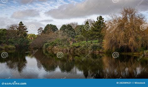 Landscape of Bushlands Reflecting into River Stock Image - Image of ...