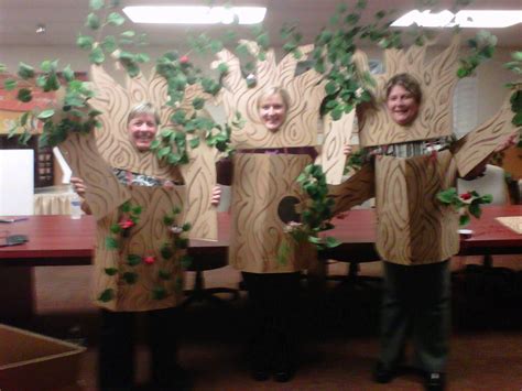 Tree Costumes Made From Scrap Cardboard And Hot Glued Silk Leaves To