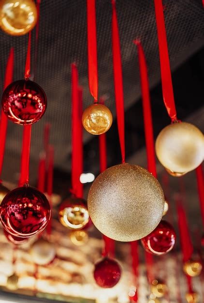 Premium Photo | Christmas decorative ball-shaped decorations hanging from the ceiling.