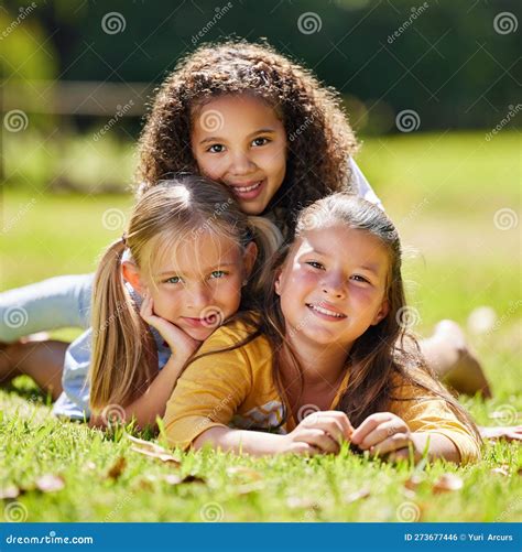 Summer Girls Portrait Or Happy Kids On Grass In Park Together For Fun