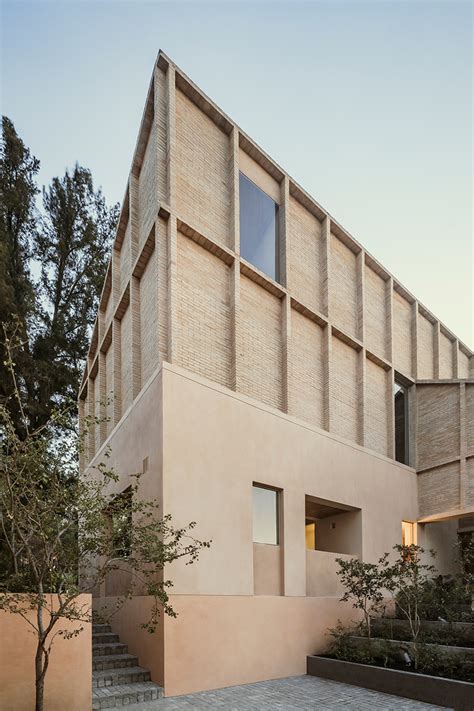 An Image Of A Building That Is Made Out Of Bricks And Concrete With