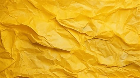 Vibrant Yellow Crumpled Paper A Captivating Background With A Textured