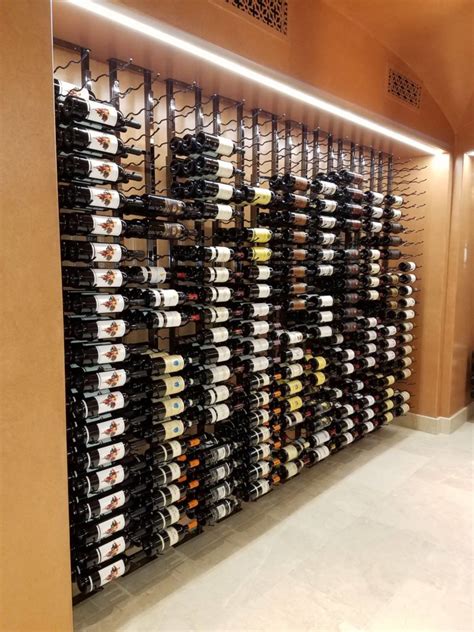 A Stunning Floor To Ceiling Metal Wine Rack Display In Irvine