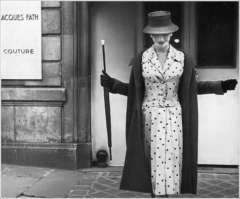 Anne Gunning In Raspberry Wool Coat Over A Raspberry Dotted Gray Silk