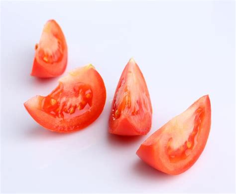 Premium Photo Slices Of Fresh Tomato Isolated On White