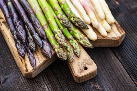 Premium Photo Green Purple And White Asparagus Sprouts