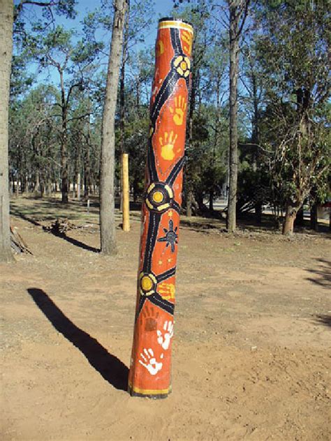 4 Photograph Of Totems Designed And Painted By Tirkandi Participants