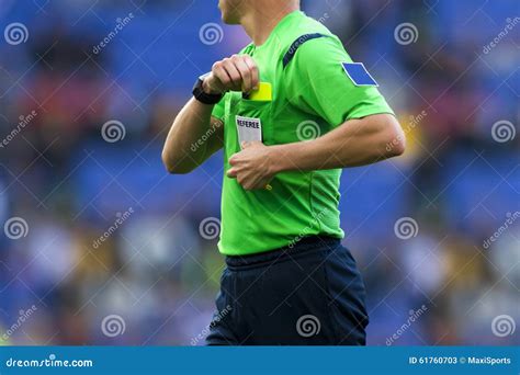 Soccer Referee Showing Yellow Card Stock Image | CartoonDealer.com #56904319