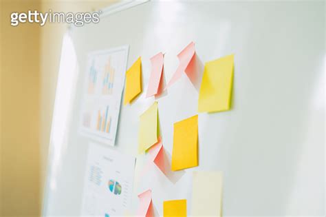 Business People Meeting At Office And Use Post It Notes To Share Idea