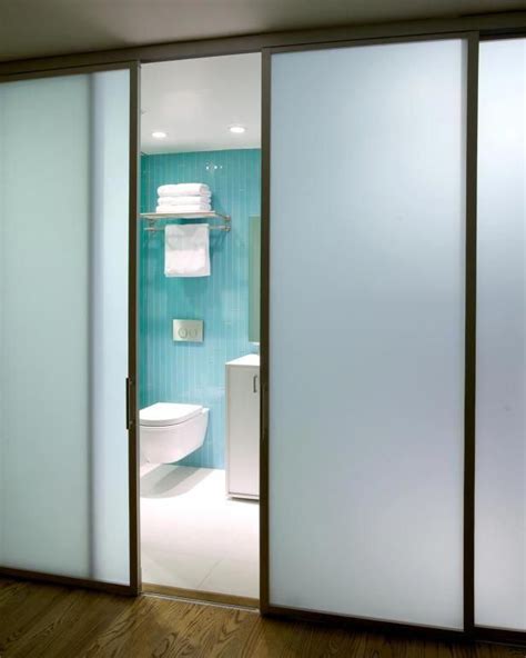 Modern Master Bathroom With Frosted Glass Doors With Images Glass