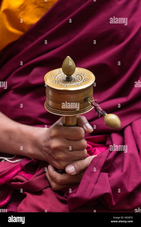 Tibetan Prayer Wheel In Monks Hands Close Up Stock Photo Alamy