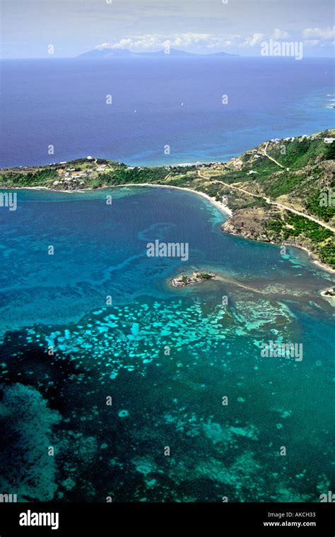 An Aerial View Of The Antigua Coastline With The Island Of Montserrat