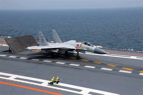 J-15 fighter of Chinese Navy aircraft carrier Liaoning conduct live ...