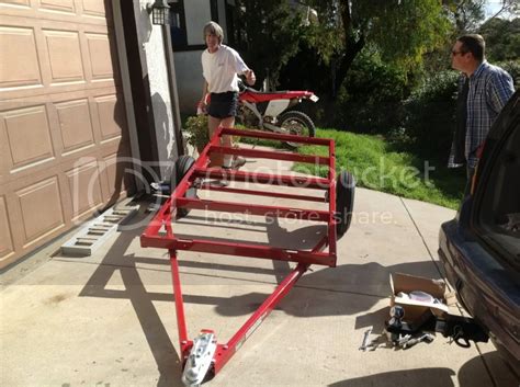 A Harbor Freight 4x8 Folding Trailer Will Hold 3 Full Size Dirt Bikes