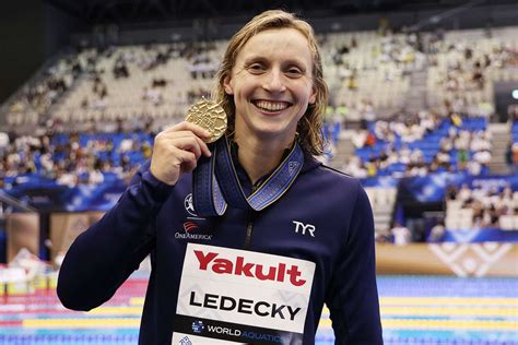 Swimmer Katie Ledecky Breaks Michael Phelps Record For World Titles