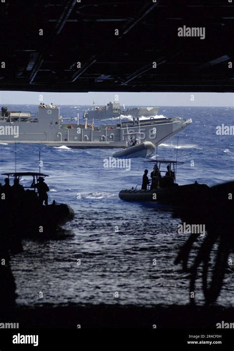 Us Navy Landing Craft Utility Lcu 1658 And Several Ridged Hulled Inflatable Boats Rhib