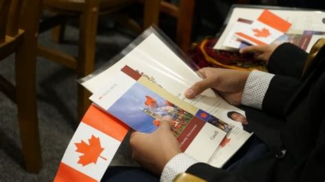 New Canadians among first to swear oath to King Charles | CBC News