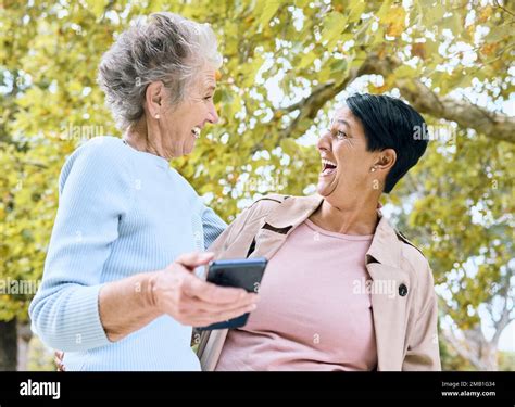 Senior Women Laughing Or Phone Meme In Nature Park Garden Or Relax