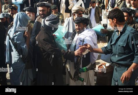 Kandahar, Afghanistan. 9th Dec, 2013. Taliban fighters attend a ...