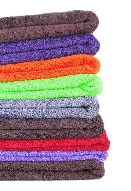 Premium Photo Pile Of Colorful Towels Isolated On White