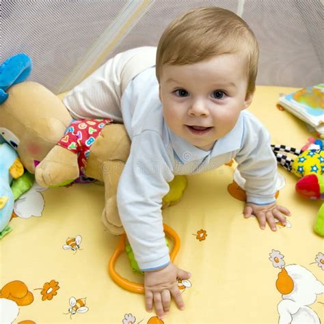 Happy baby on bed stock image. Image of beautiful, childhood - 16241685