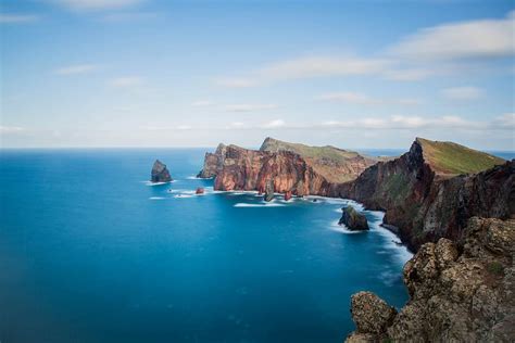 HD wallpaper: landscape photography of blue body of water with island ...