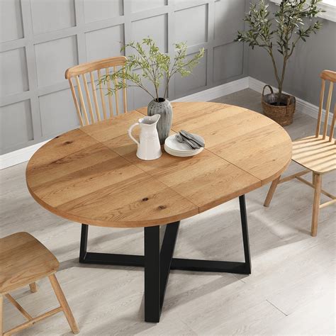 Bern Extending Round Dining Table With Metal Legs Oak Daals