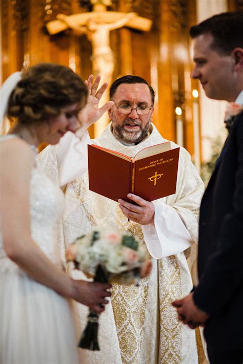 Catholic Wedding Mass Priest Blessing Bride and Groom | Wedding mass