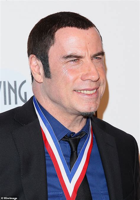 John Travolta Continues To Showcase His Newly Shaved Head At Living Legends Of Aviation Awards