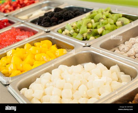 ‎Frozen yogurt toppings bar. Yogurt toppings ranging from fresh fruits ...