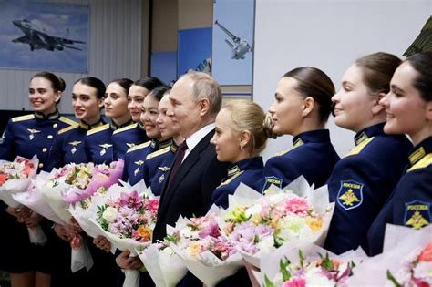 Putin lauds Russian women for motherhood, beauty | The Straits Times